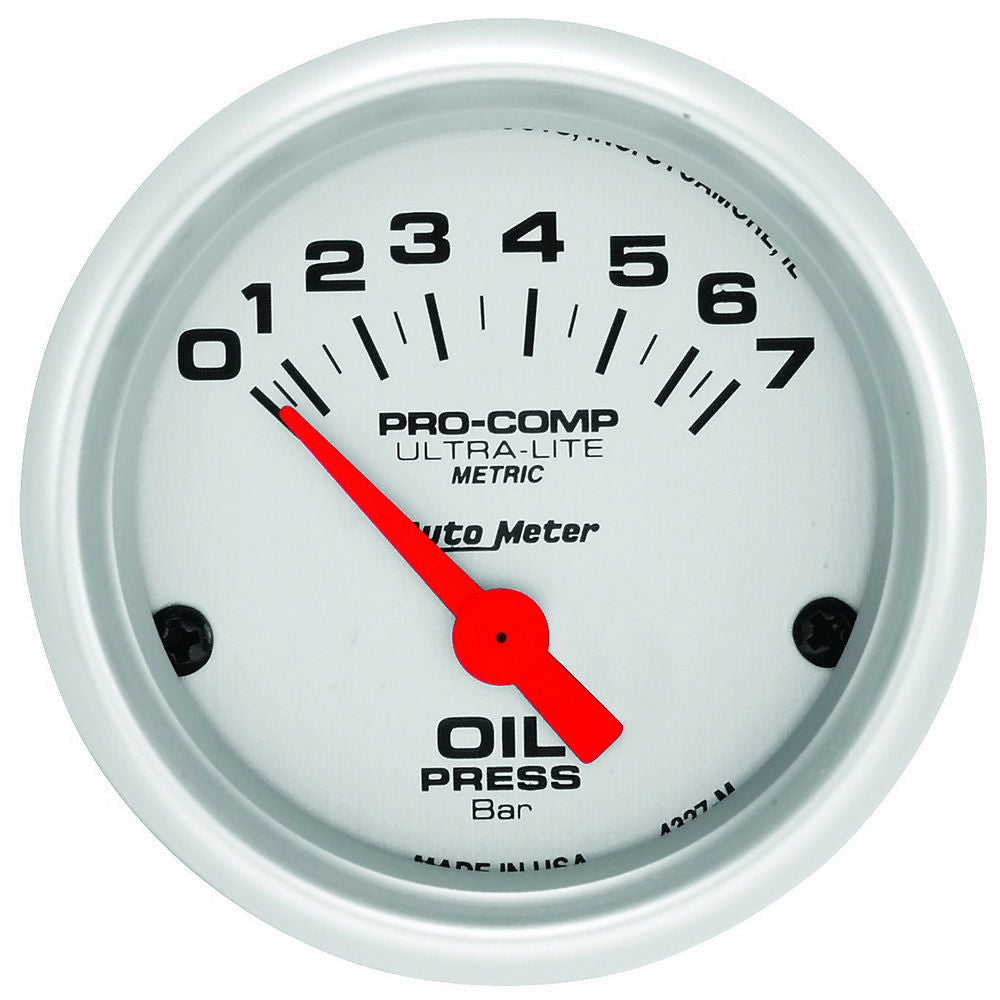 Traditional incandescent lighting illuminates around the perimeter of the dial