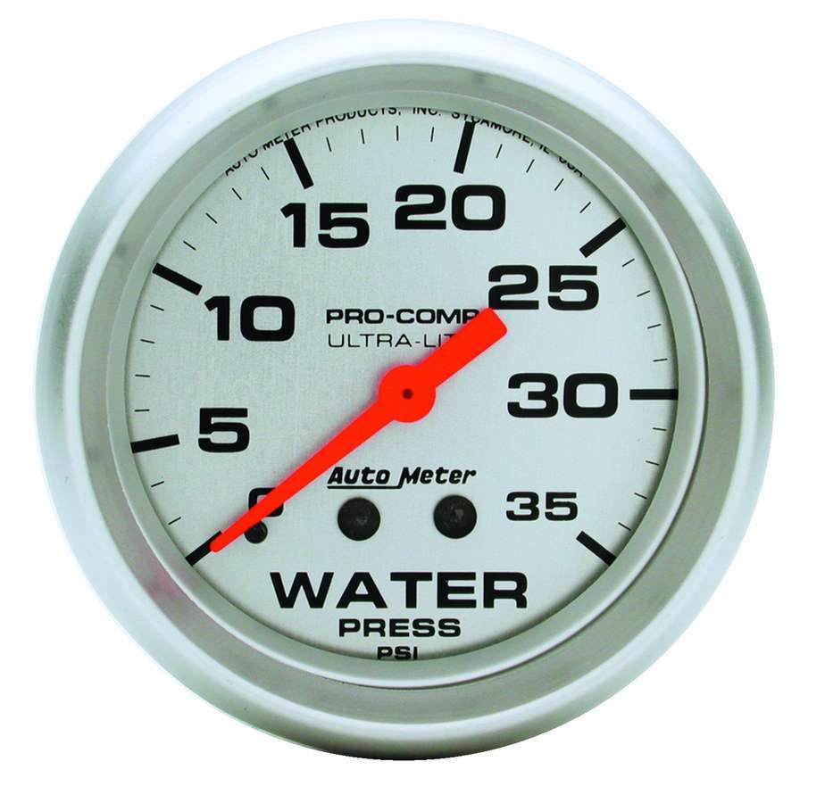 Traditional incandescent lighting illuminates around the perimeter of the dial