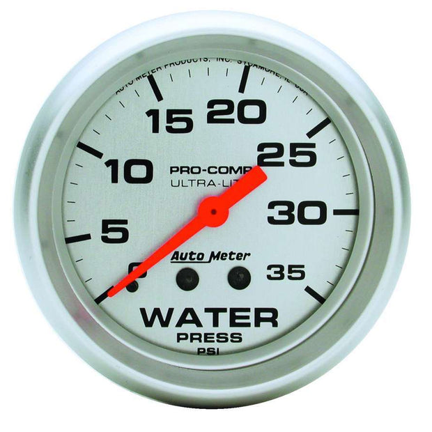 Traditional incandescent lighting illuminates around the perimeter of the dial